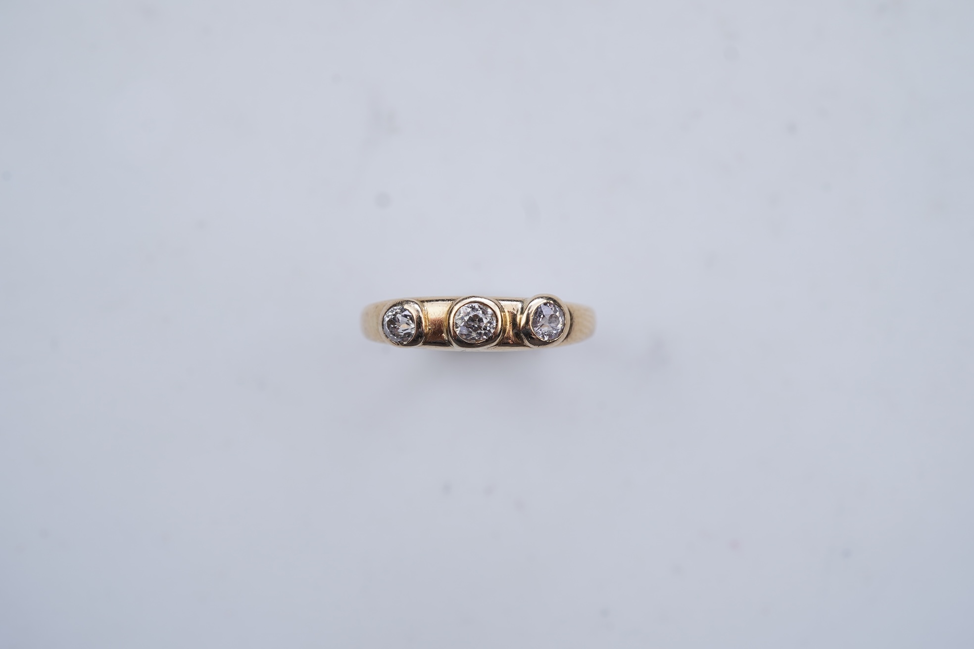 A three-stone diamond ring